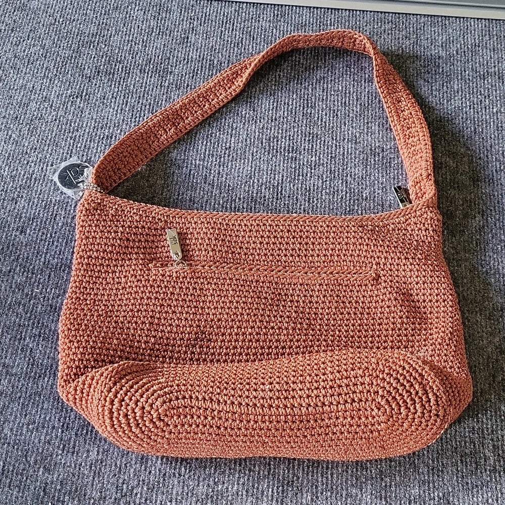 The SAK Burnt Orange Crochet Shoulder Bag​​